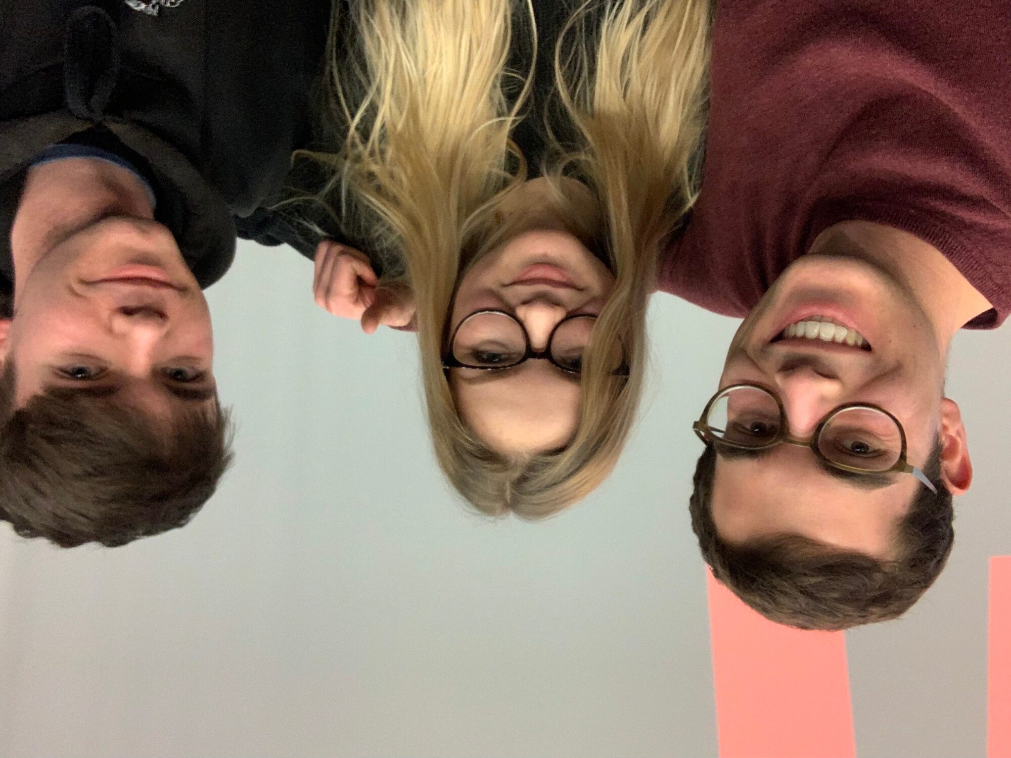 Marius, Elena and Charlie getting a selfie together.