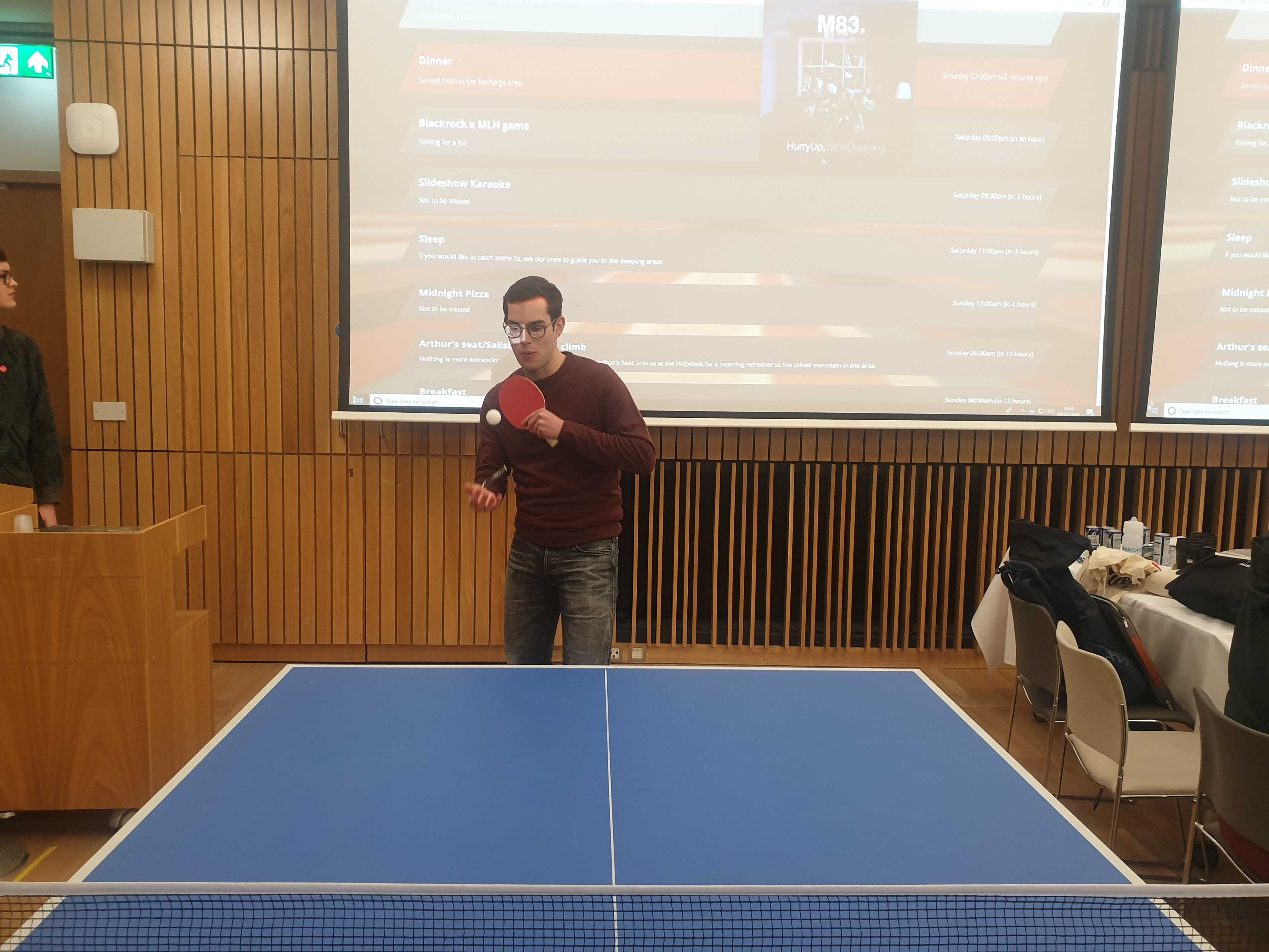 Marius and Charlie playing table tennis